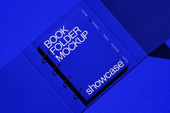 Blue book folder mockup design on a blue background ideal for presentation templates, branding mockups, and graphic design assets.